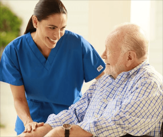 Caregiver assisting senior resident