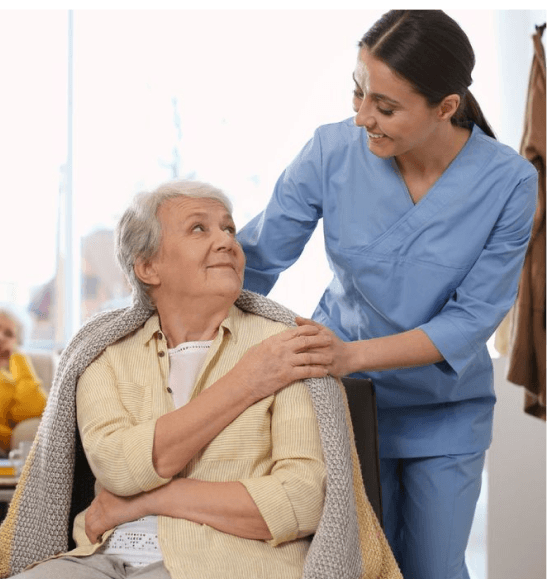 Caregiver assisting resident